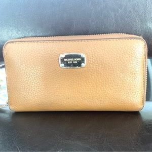 Michael Kors light brown pebbled leather large zip closure wallet